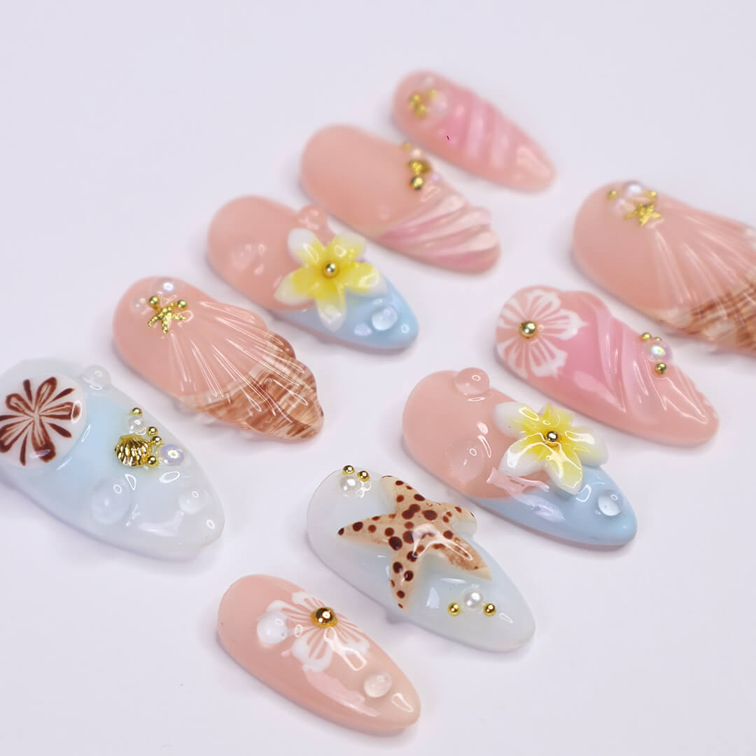 pastel summer nails  with seashells, daisies, starfish, and pearls — handmade luxury nail art in pastel pink and soft blue tones, reusable and custom-fit — perfect for beach getaways, tropical nails art for holiday, vacation, beach day