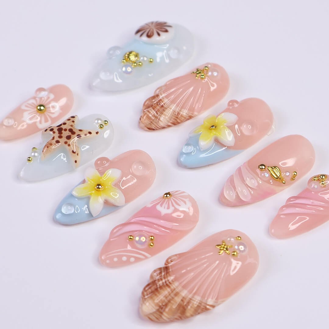 pastel summer nails  with seashells, daisies, starfish, and pearls — handmade luxury nail art in pastel pink and soft blue tones, reusable and custom-fit — perfect for beach getaways, tropical nails art for holiday, vacation, beach day