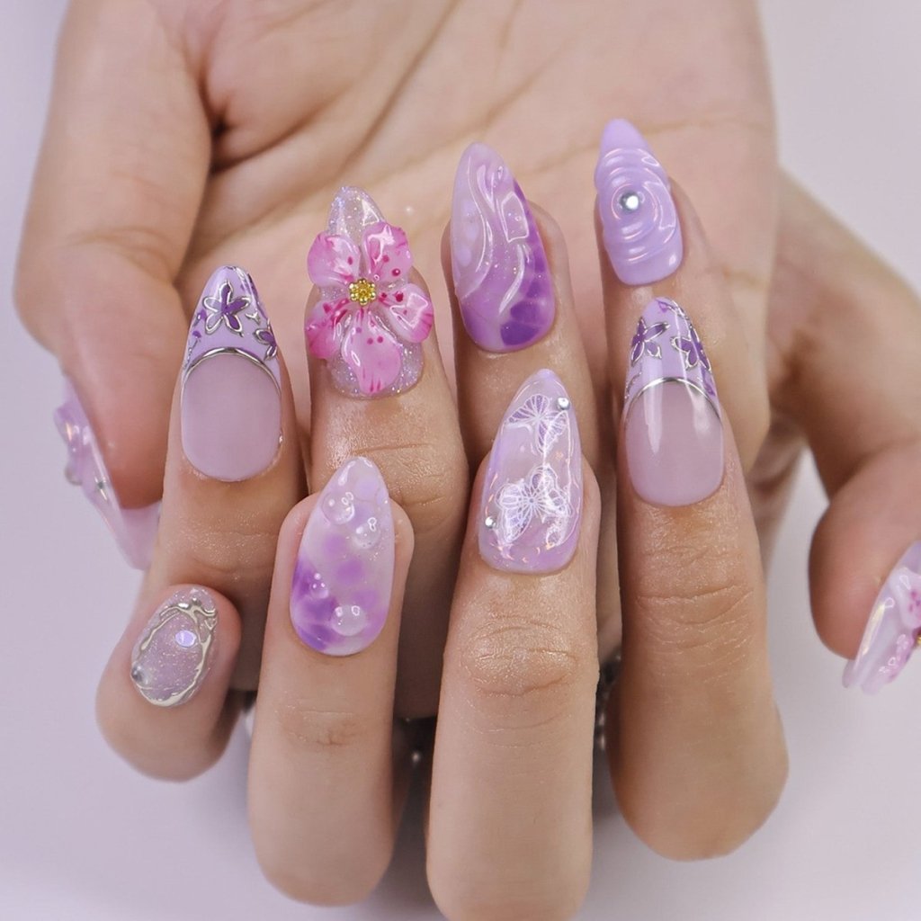 3D purple and lavender press on nails with butterfly art, pink sakura flowers, glossy swirls, and crystal bow charms — custom press on nails, luxury handmade nail art, fake nails, false nails, pressons — perfect for spring, summer, romantic gifts, or soft aesthetic lovers