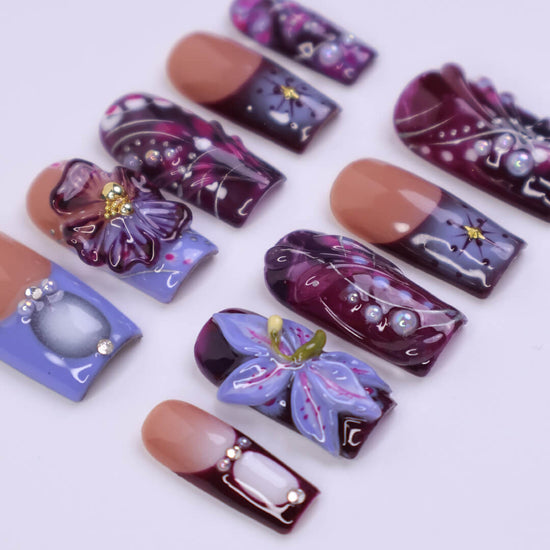 3D galaxy press on nails with  purple flowers, stars, and abstract swirl patterns in deep plum, violet, and lilac tones — featuring crystal accents, glossy finishes, and hand-painted cosmic details — handmade press on nails, luxury nail art, fake nails, false nails, pressons — perfect for night-out glam, artistic nail lovers, or dreamy gifting.