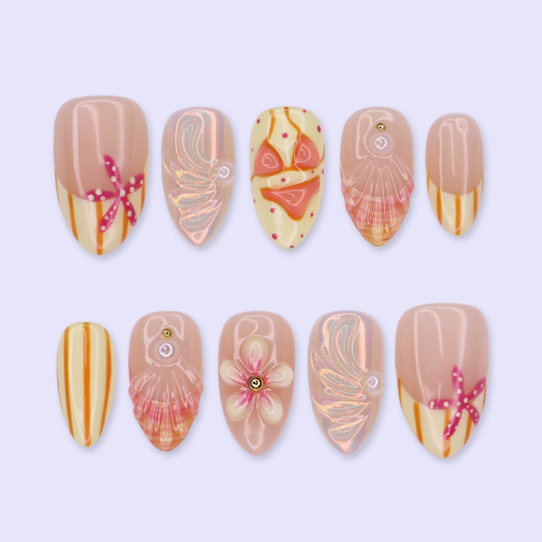 Handmade summer press-on nails with peach base, orange stripes, hand-painted bikini, pink starfish and iridescent seashell shimmer by Lily Nails Art