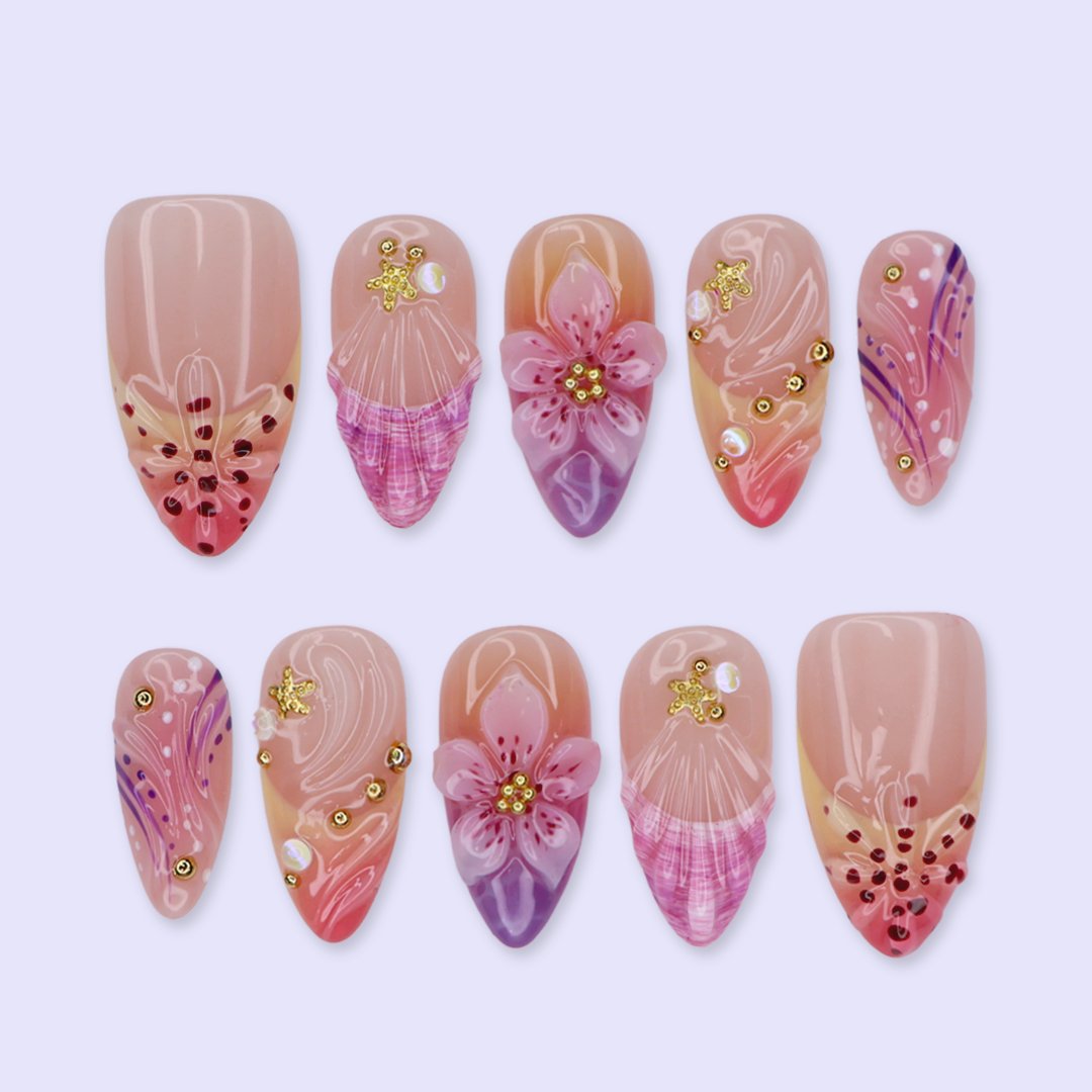 Handmade summer press-on nails with rose and lavender watercolour florals, 3D bloom centrepiece and gold star embellishments by Lily Nails Art