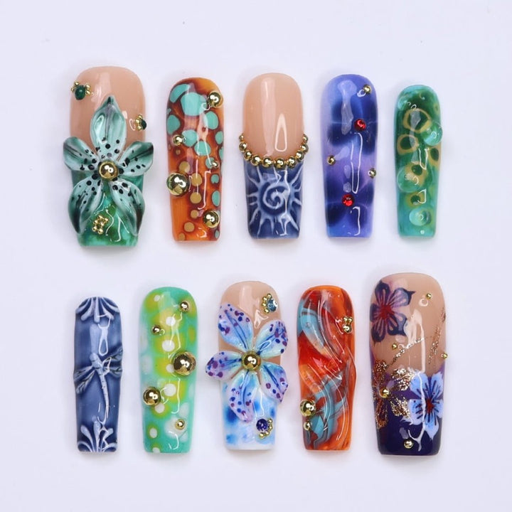 3D abstract press on nails with ocean-inspired patterns, dragonflies, sculpted florals, and swirl textures in deep green, navy, orange, and teal tones — handmade summer nails, tropical press on nails, luxury fake nails, false nails, pressons — perfect for bold vacation looks, artistic nail lovers, or gifting for her.