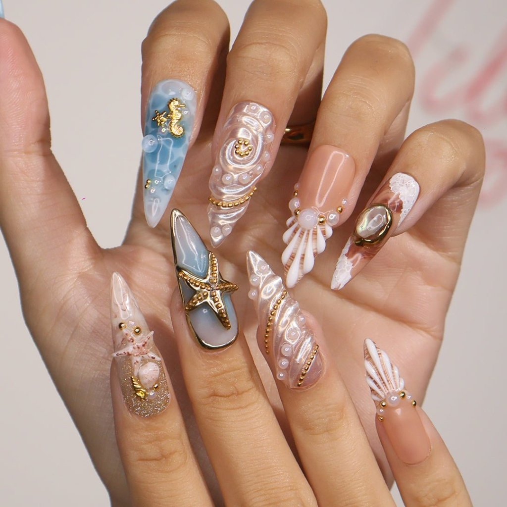 3D ocean press on nails with starfish, seashells, pearls, and turtles — featuring marble wave textures, gold accents, and sculpted shell designs in sandy nude, pearl white, and ocean blue tones — summer vacation nails, beach press on nails, custom handmade nail art, fake nails, false nails, pressons — perfect for coastal getaways, mermaid vibes, or tropical gifting.