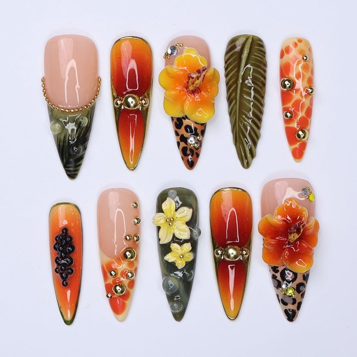 3D tropical press on nails with sunset ombré, hibiscus flowers, leopard print, and jungle leaves in orange and olive tones — summer vacation nails, tropical handmade nail art, fake nails, false nails, pressons — perfect for beach getaways or statement summer looks.