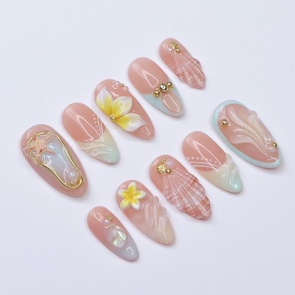 3D beach press on nails with seashells, starfish, plumeria flowers, and soft pastel waves, featuring gold charms, pearl details, and glossy ocean-inspired accents — summer vacation nails, ocean press on nails, custom handmade nail art, fake nails, false nails, pressons — perfect for tropical getaways, beach weddings, or gifting for her.

