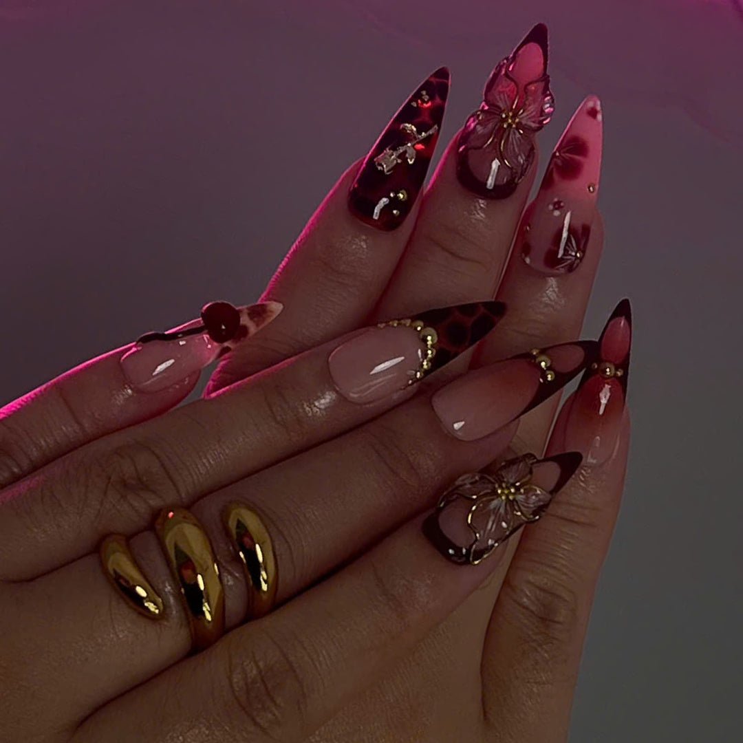 Handmade Press-On Nails with deep cherry tones, 3D floral accents, gold details, and glossy finishes. Perfect for holidays, birthdays, or as a luxurious gift for her
