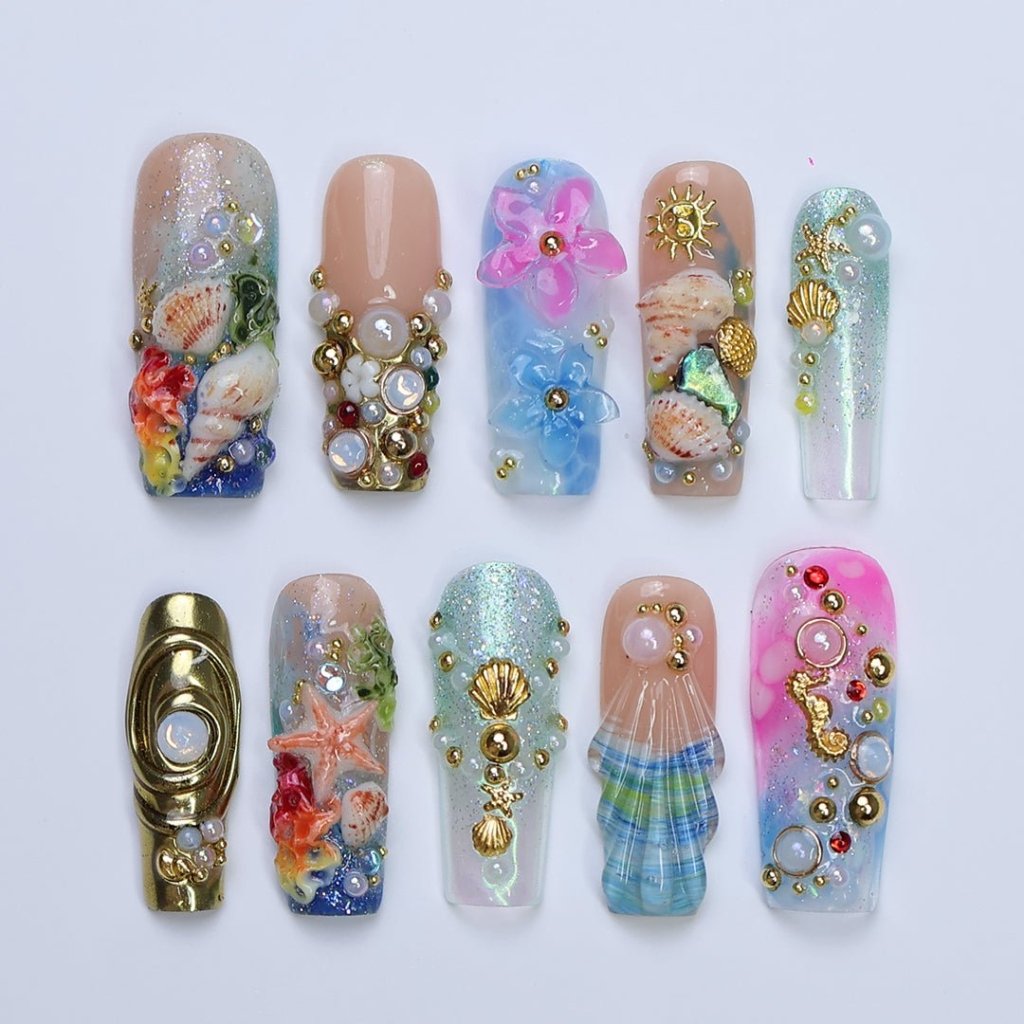 3D ocean-inspired press on nails with gold seashells, starfish, seahorses, pearl accents, and hand-sculpted flowers — featuring iridescent shimmer, coral reef textures, and beachy plaid seashell tips — luxury summer press on nails, beach vacation nails, handmade fake nails, false nails, pressons — perfect for coastal getaways, mermaid-themed looks, or gifting for ocean lovers.