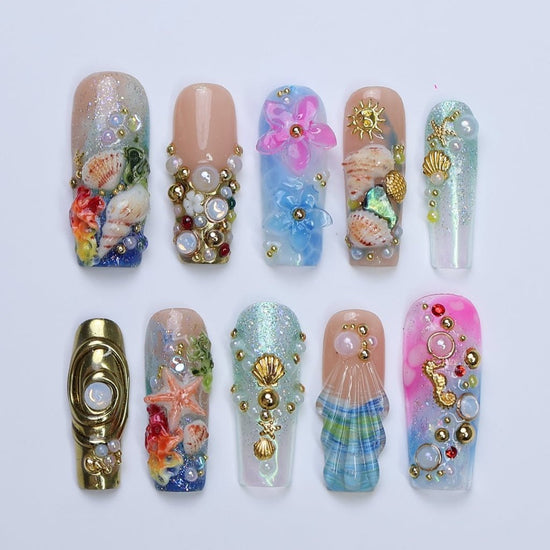 3D ocean-inspired press on nails with gold seashells, starfish, seahorses, pearl accents, and hand-sculpted flowers — featuring iridescent shimmer, coral reef textures, and beachy plaid seashell tips — luxury summer press on nails, beach vacation nails, handmade fake nails, false nails, pressons — perfect for coastal getaways, mermaid-themed looks, or gifting for ocean lovers.