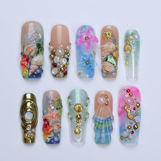 3D ocean-inspired press on nails with gold seashells, starfish, seahorses, pearl accents, and hand-sculpted flowers — featuring iridescent shimmer, coral reef textures, and beachy plaid seashell tips — luxury summer press on nails, beach vacation nails, handmade fake nails, false nails, pressons — perfect for coastal getaways, mermaid-themed looks, or gifting for ocean lovers.