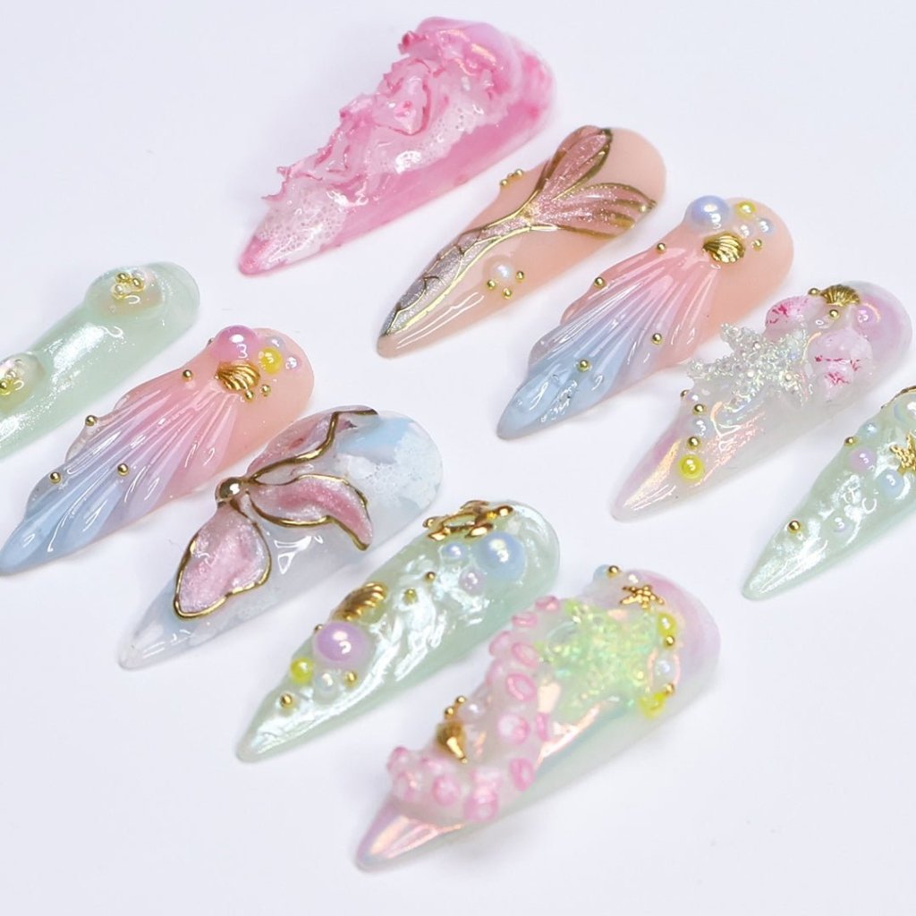 3D pastel press on nails with mermaid tail, pearl accents, seashell charms, and soft ocean shimmer — Seabelle custom handmade nails, summer vacation nails, luxury beach nail art, reusable fake nails, press ons — perfect for beach holidays and dreamy summer escapes.
