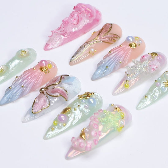 3D pastel press on nails with mermaid tail, pearl accents, seashell charms, and soft ocean shimmer — Seabelle custom handmade nails, summer vacation nails, luxury beach nail art, reusable fake nails, press ons — perfect for beach holidays and dreamy summer escapes.