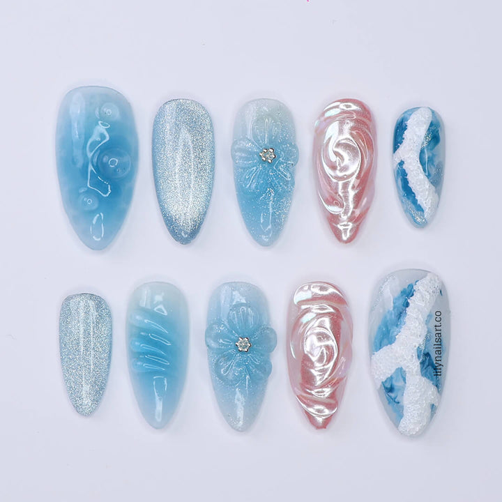 3D ocean-inspired press-on nails with sculpted pearl swirls, water ripple textures, seafoam accents, glitter shimmer, and hand-crafted blue florals — luxury custom made  medium almond nails in blue ocean tones — perfect for beach weddings, summer escapes, holiday, vacation