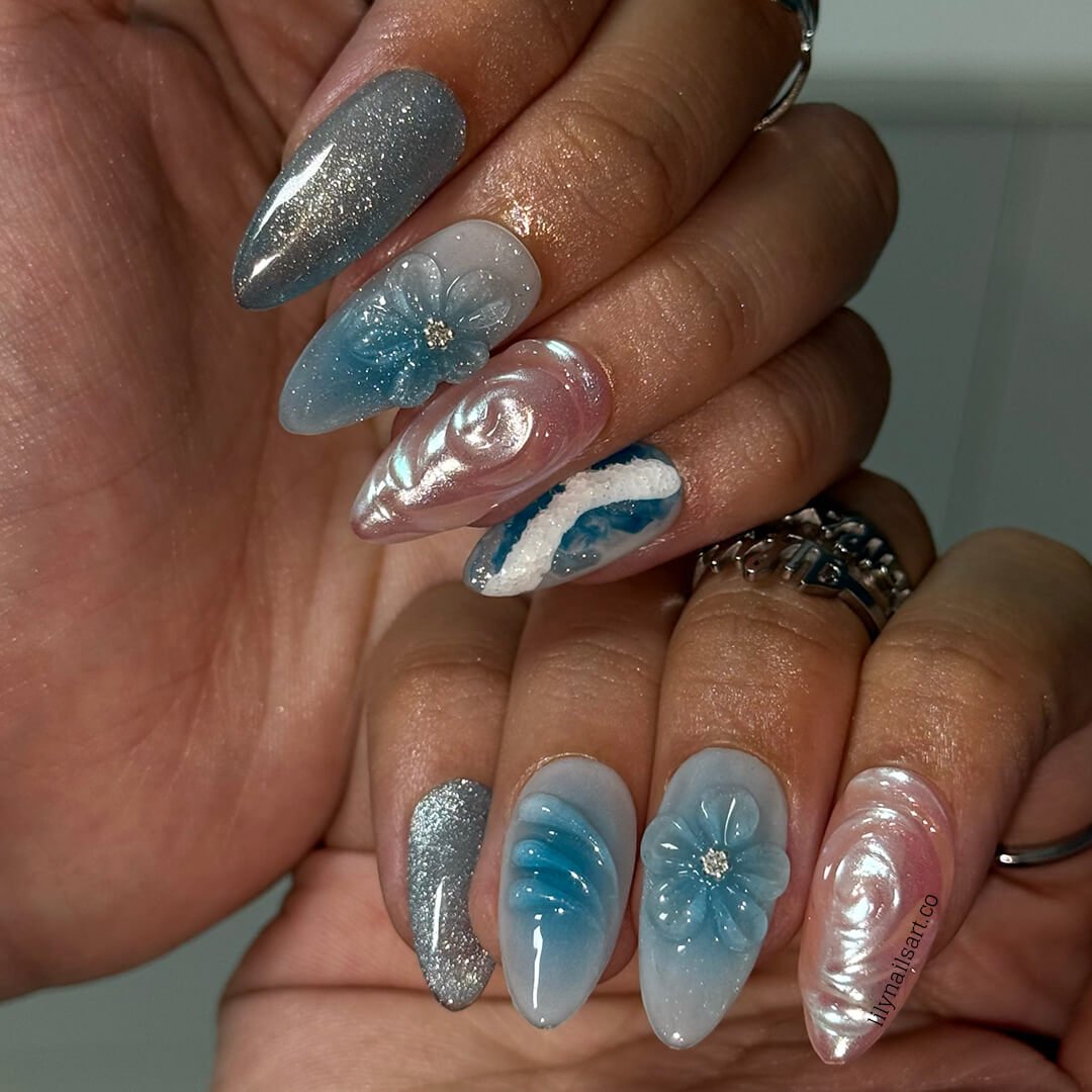 3D ocean-inspired press-on nails with sculpted pearl swirls, water ripple textures, seafoam accents, glitter shimmer, and hand-crafted blue florals — luxury custom made  medium almond nails in blue ocean tones — perfect for beach weddings, summer escapes, holiday, vacation