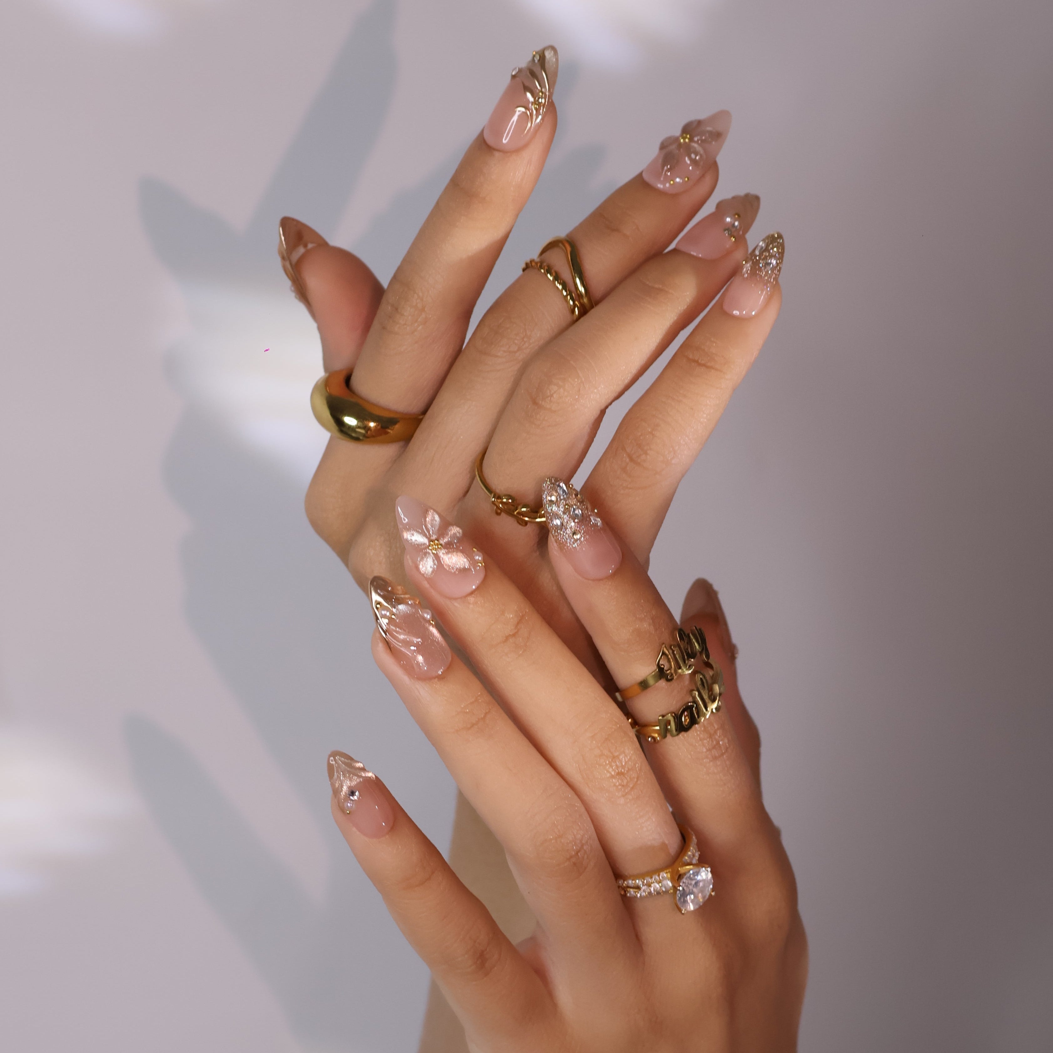 3D blush-to-gold shimmer press on nails with sculpted floral accents, embellished with crystals and pearls on a nude base — custom press on nails, luxury handmade nail art, fake nails, false nails, pressons — perfect for prom, galas, and special occasions