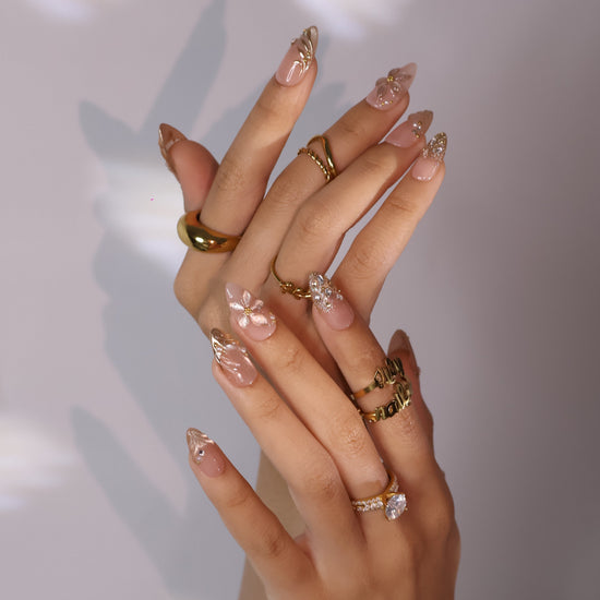 3D blush-to-gold shimmer press on nails with sculpted floral accents, embellished with crystals and pearls on a nude base — custom press on nails, luxury handmade nail art, fake nails, false nails, pressons — perfect for prom, galas, and special occasions