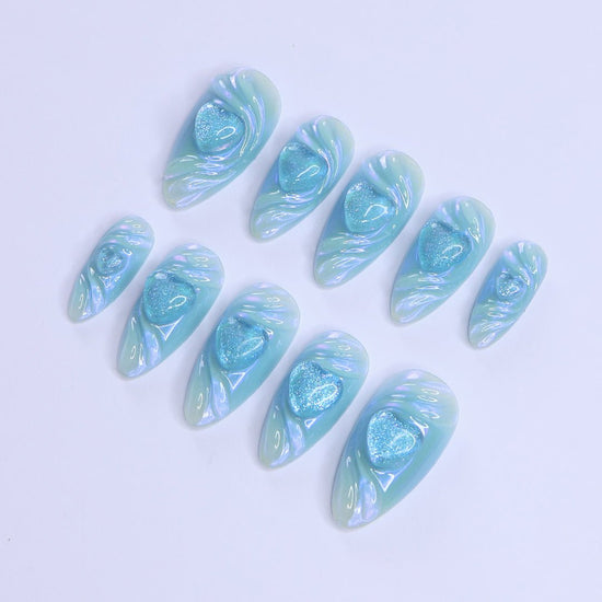 Handmade Blue Heart Press-On Nails – Valetine Collection - soft blue tones with shimmering 3D heart accents. Perfect for birthdays, holidays, anniversaries, or as a thoughtful gift for her. blue hearts press on nails 