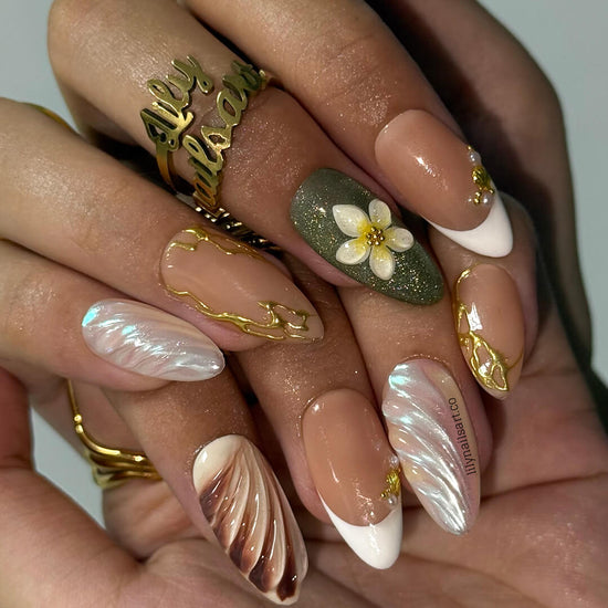 3D press-on nails featuring sculpted flowers, seashell swirl textures, pearl accents, and gold linework — handmade custom nails in earthy sage green, bronze, nude, and soft white tones — perfect for destination weddings, luxury getaways, or elegant summer days, holiday