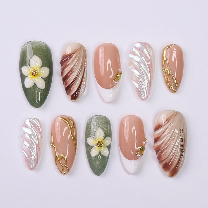 3D press-on nails featuring sculpted flowers, seashell swirl textures, pearl accents, and gold linework — handmade custom nails in earthy sage green, bronze, nude, and soft white tones — perfect for destination weddings, luxury getaways, or elegant summer days, holiday