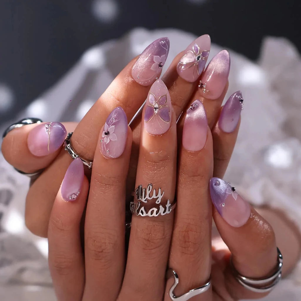 3D lavender ombré press on nails with gold butterfly motif, embellished with white floral accents and crystals — custom press on nails, luxury handmade nail art, fake nails, false nails, pressons — perfect for prom, spring events, and fairy-tale aesthetics