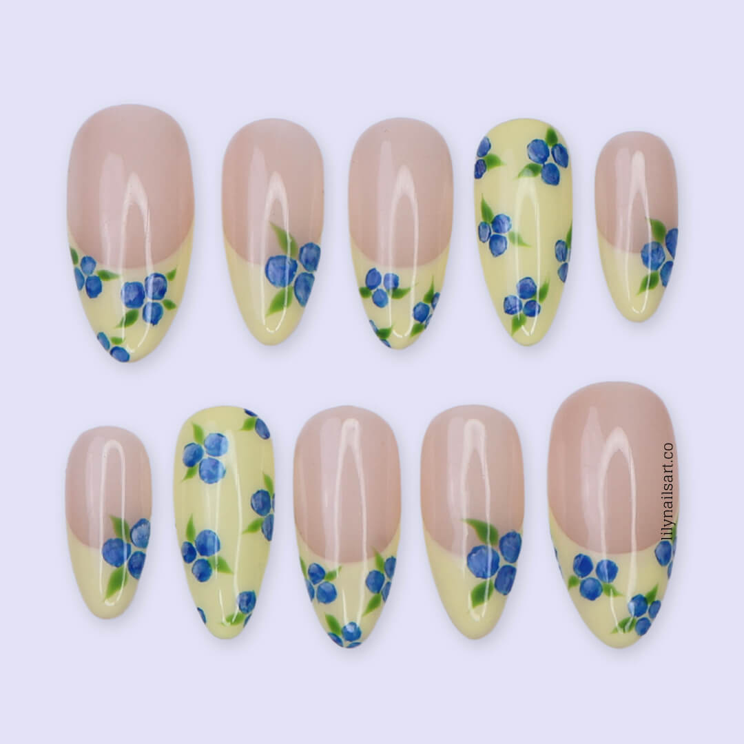 Handmade Blueberry Press On Nails with Yellow French Tips and 3D Florals in Medium Almond shape — reusable summer fruit nail art gift.