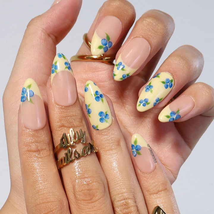 Handmade Blueberry Press On Nails with Yellow French Tips and 3D Florals in Medium Almond shape — reusable summer fruit nail art gift.