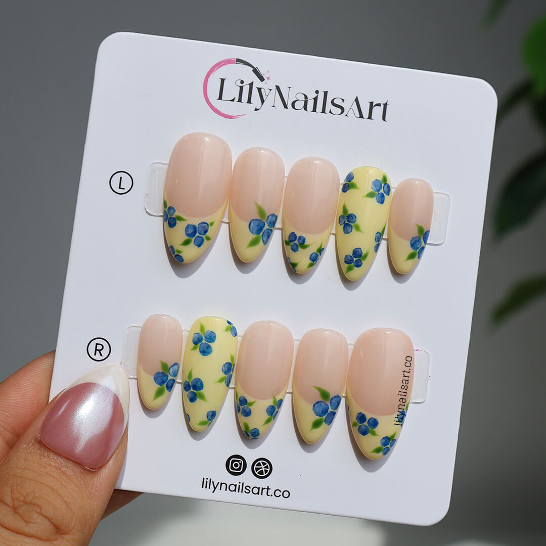 Handmade Blueberry Press On Nails with Yellow French Tips and 3D Florals in Medium Almond shape — reusable summer fruit nail art gift.
